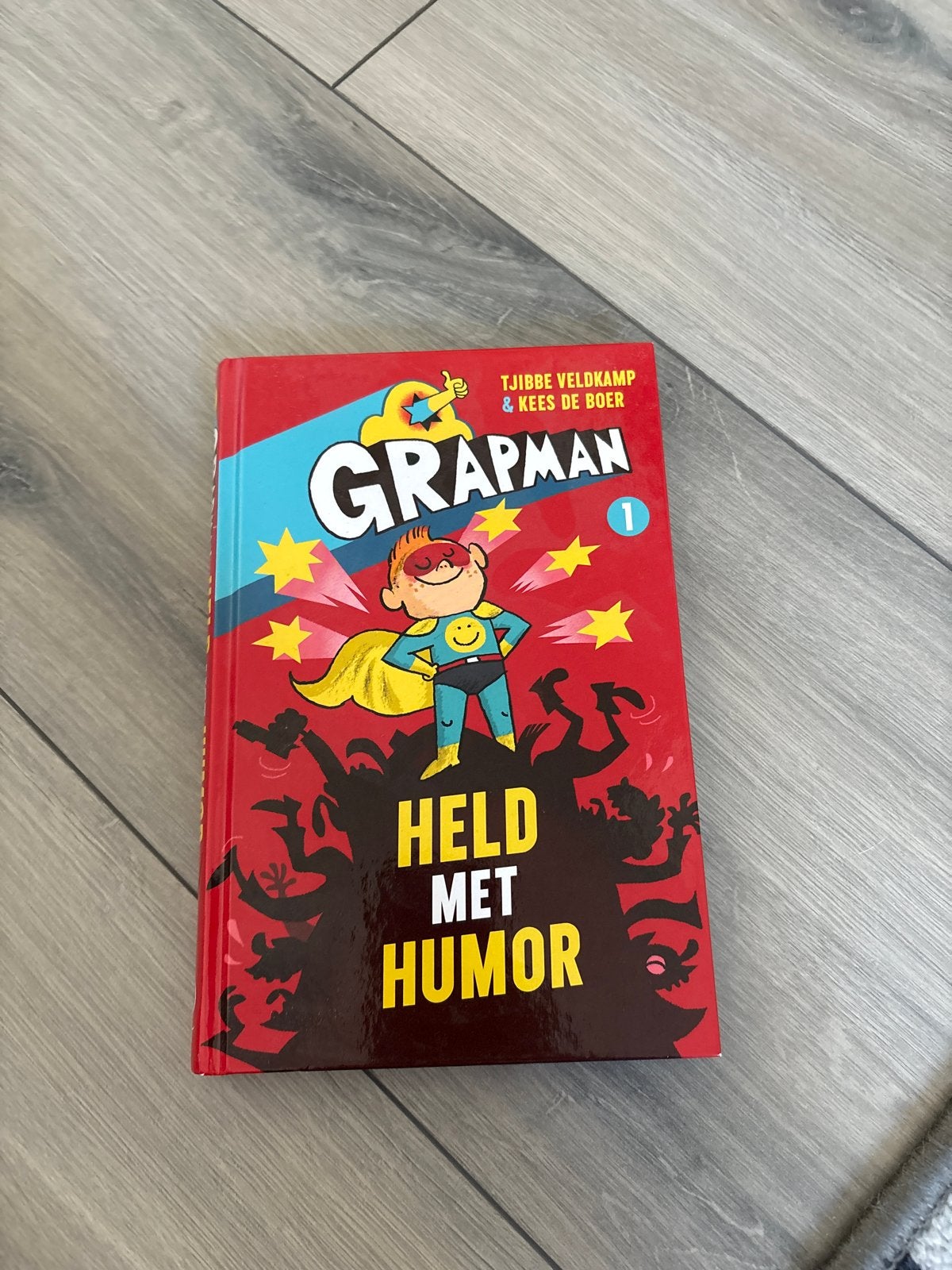 Grapman: Held met Humor - Tjibbe Veldkamp & Kees de Boer, Boeken, Ophalen of Verzenden, Zo goed als nieuw, Fictie