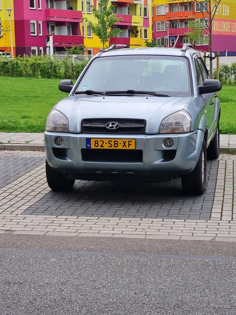 Hyundai Tucson 2.0 I 2WD 2005 Grijs, Stof, 4 cilinders, Origineel Nederlands, 75 €/maand