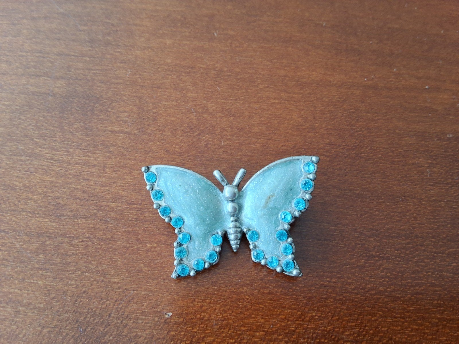 Antieke vlinderbroche met blauwe steentjes, Ophalen of Verzenden, Blauw, Overige materialen