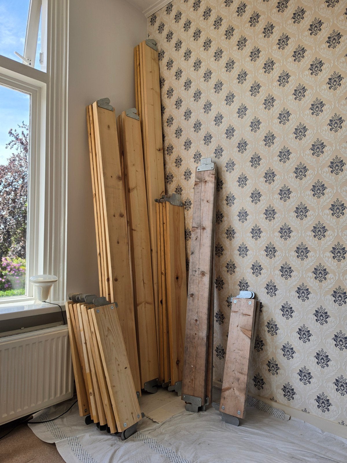 Houten kantplanken voor (rol)steigers, Ophalen