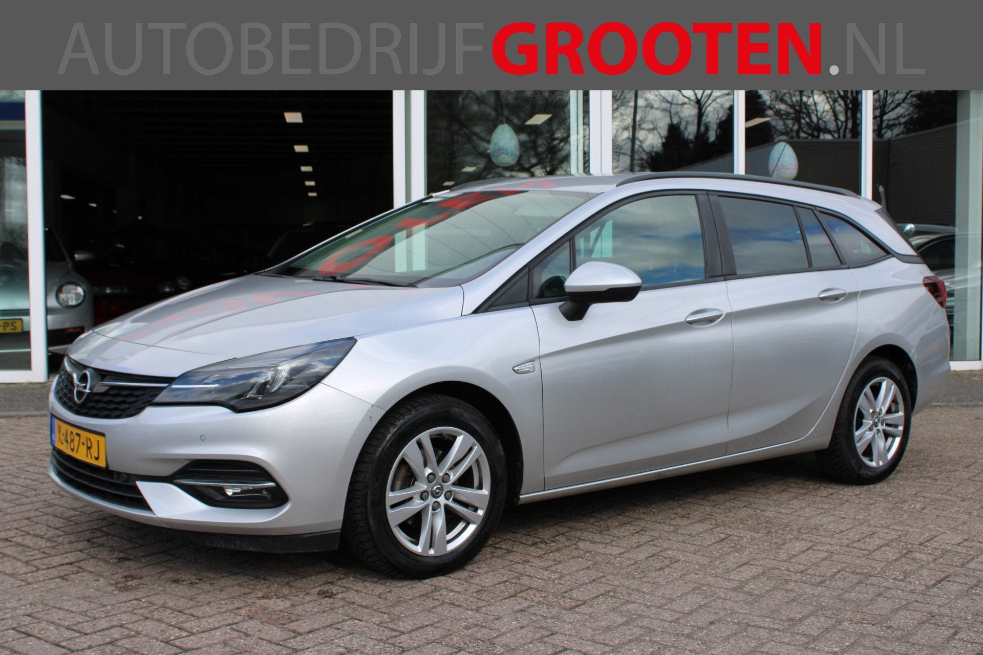 Opel Astra Sports Tourer 1.2 Business Edition (bj 2021), Auto's, Voorwielaandrijving, Dealer onderhouden, Stof, Gebruikt