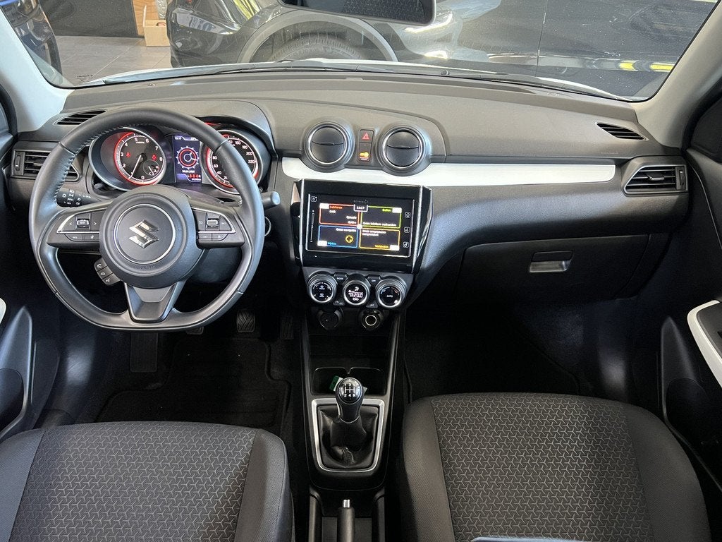 Suzuki Swift 1.0 Style Smart Hybrid Sportline Carplay Stoelv, Auto's, Voorwielaandrijving, Stof, Gebruikt, 850 kg