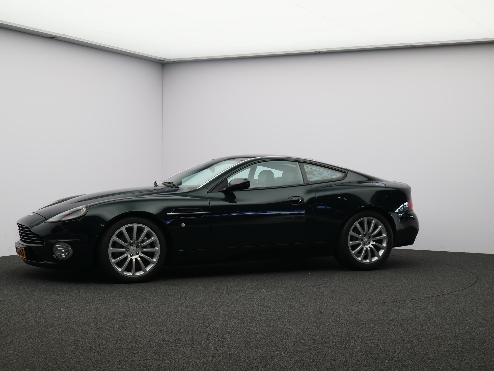 Aston Martin Vanquish 5.9 V12 470PK Automaat / Leder, Auto's, Automaat, Achterwielaandrijving, Gebruikt, 5935 cc