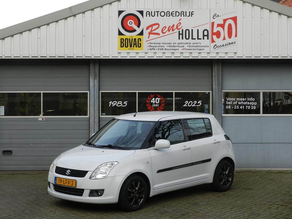 Suzuki Swift 1.3 5Deurs Cool Airco CV afst Isofix LMV Reserv, Voorwielaandrijving, Stof, Zwart, 400 kg
