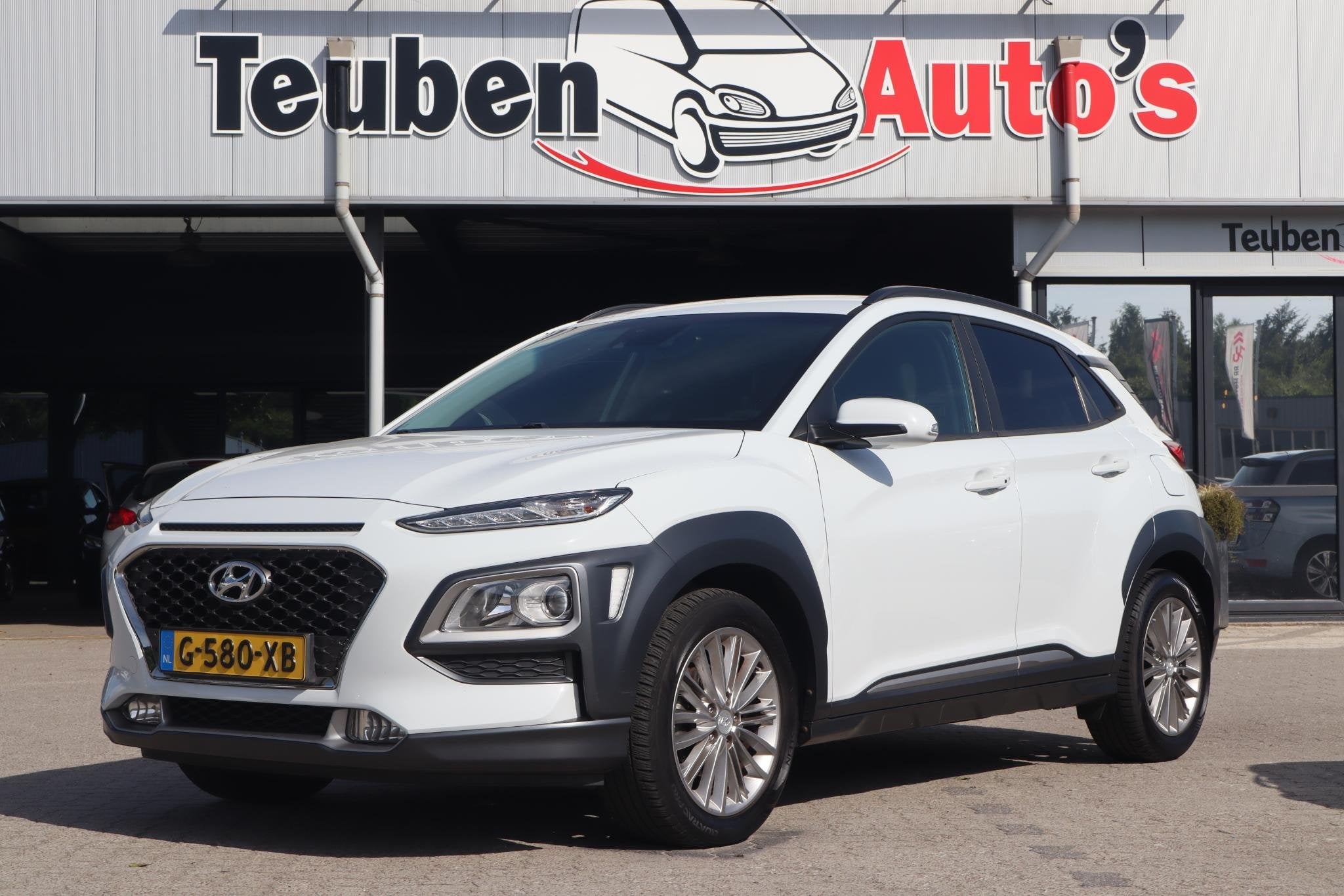 Hyundai Kona 1.0T Premium | Camera | Trekhaak | Cruise contr, Auto's, Gebruikt, Euro 6, Wit, Handgeschakeld