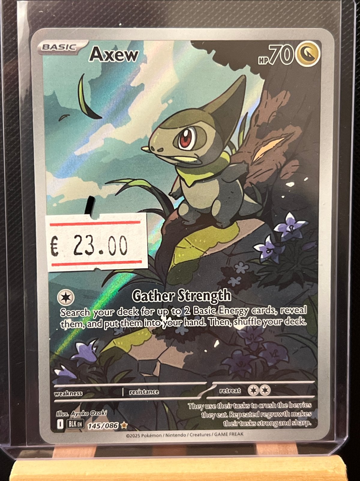 Pokémon Kaart Axew 145/086 Basic Foil, Ophalen of Verzenden, Zo goed als nieuw, Losse kaart, Foil