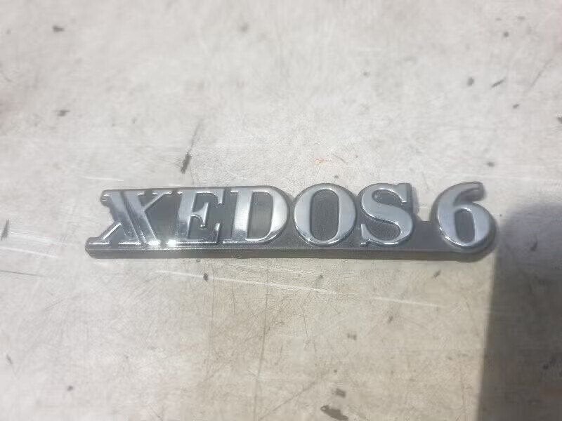 EMBLEEM Mazda Xedos 6 (01-1992/01-1999), Gebruikt, Ophalen of Verzenden, Hitdorfer Straße 73 51371 Leverkusen, DE, Mazda