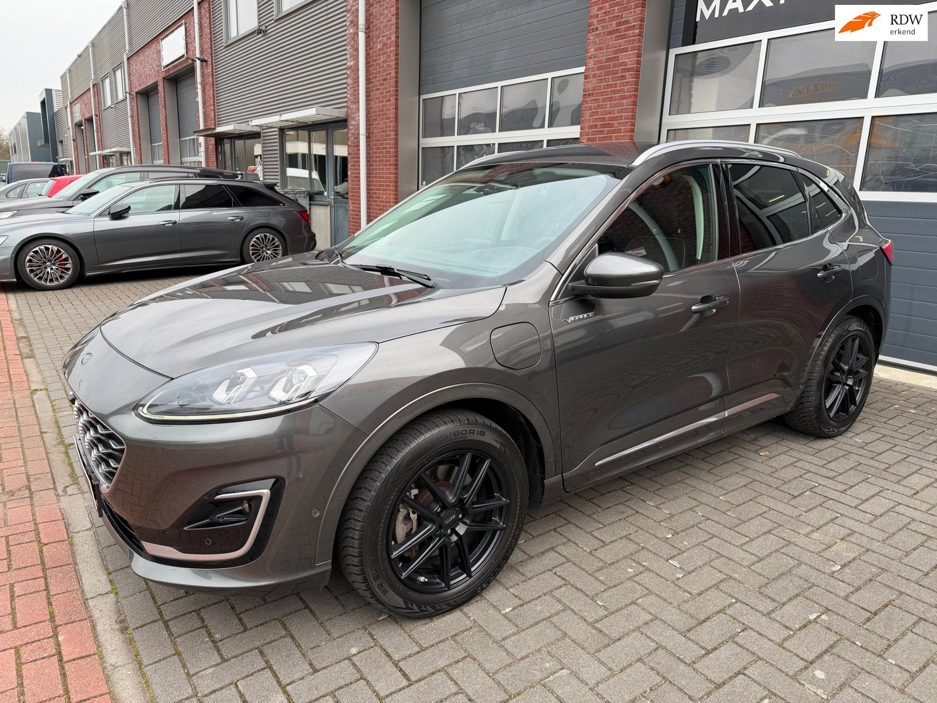 Ford KUGA 2.5 PHEV Vignale LED ACC Camera Trekhaak HUD B&O, Auto's, 14 kWh, Gebruikt, 4 cilinders, Bedrijf