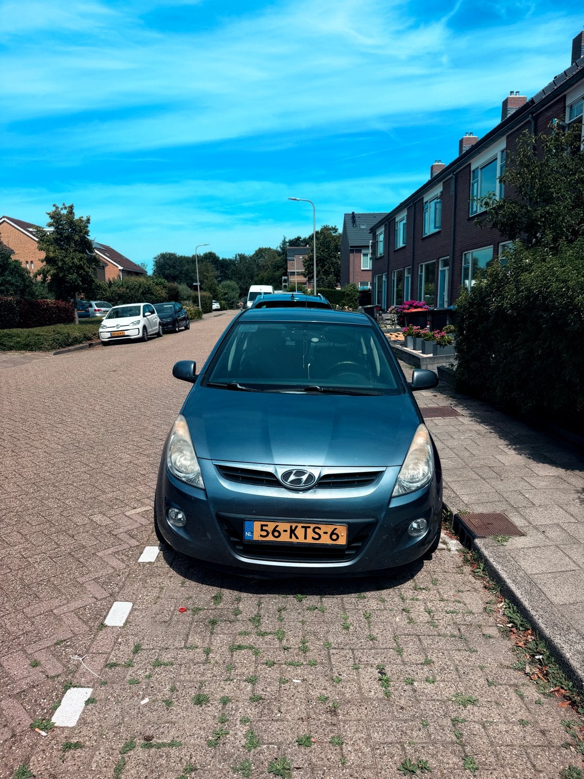 Hyundai i20 1.2 5-DRS 2010 Grijs, Auto's, Hyundai, 450 kg, 4 cilinders, Sound system, Leder en Stof