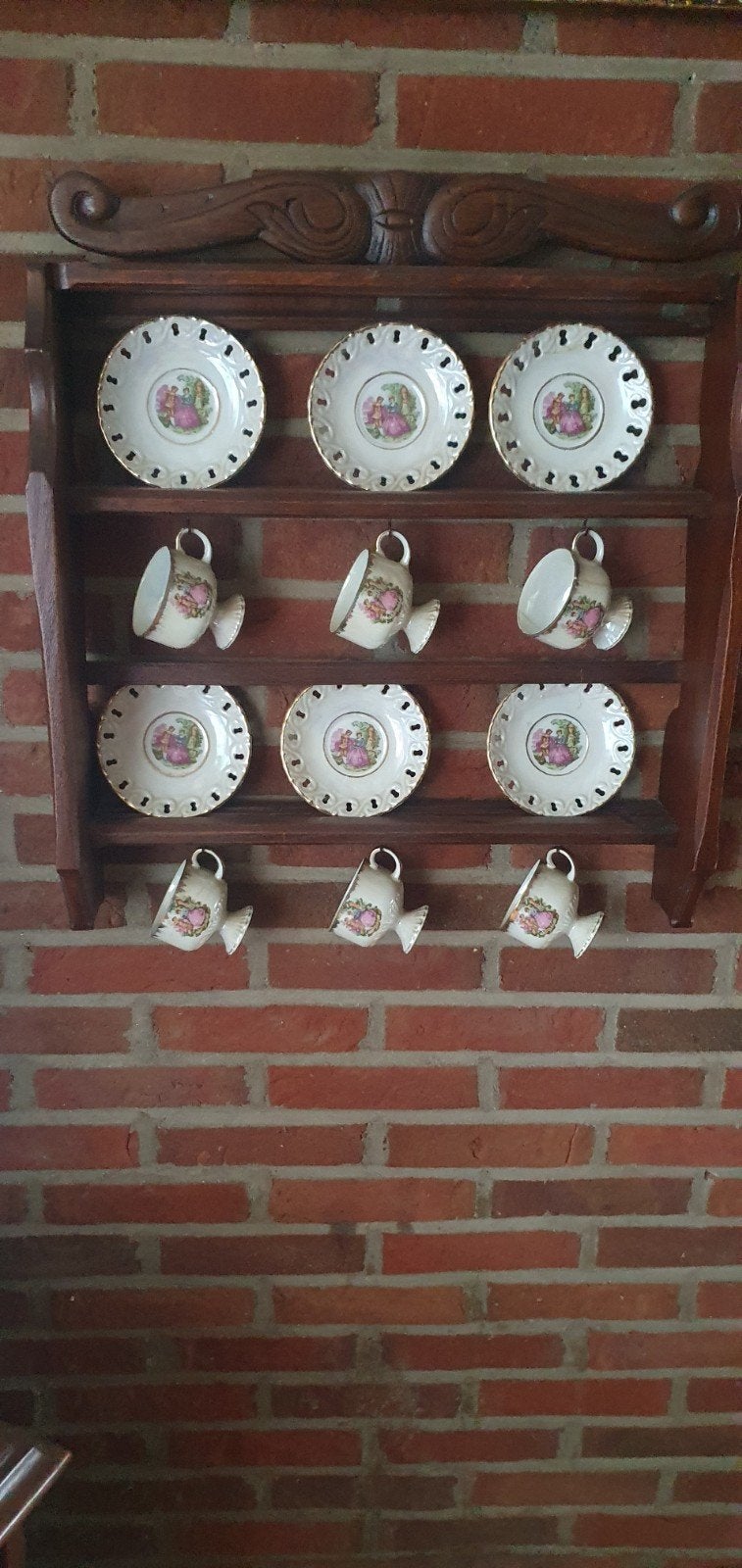 Antiek theeservies met wandrek, Ophalen