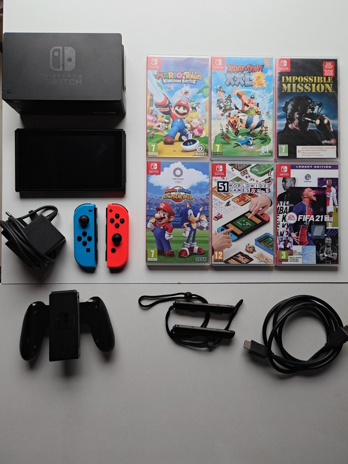 Nintendo Switch + 6 games waaronder 2× Mario - Complete set, Ophalen of Verzenden, Zo goed als nieuw, Met 2 controllers, Switch Original
