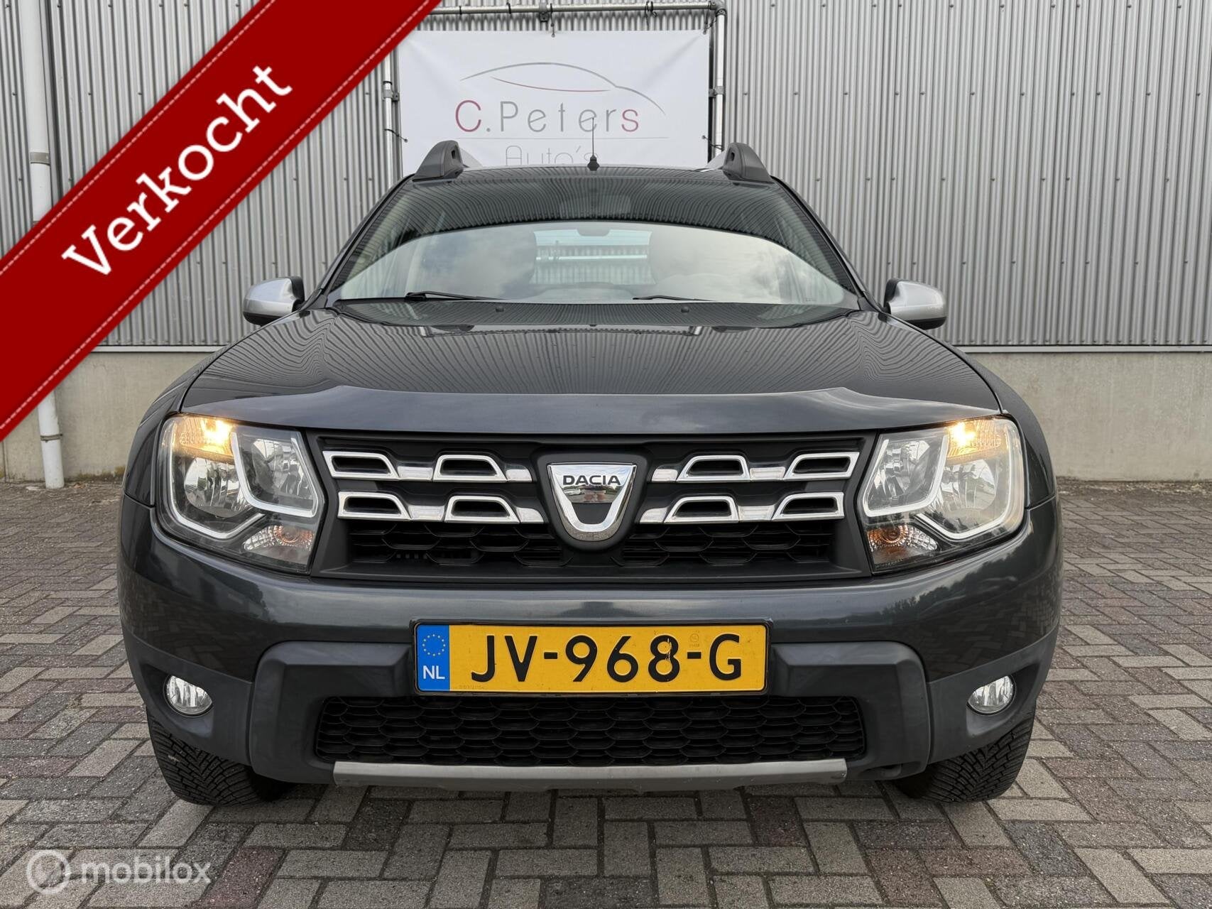 Dacia Duster 1.2 TCe 4x2 Prestige 2016 / Navigatie / Trekhaa, Auto's, Dacia, Gebruikt, Euro 6, Duster, 635 kg