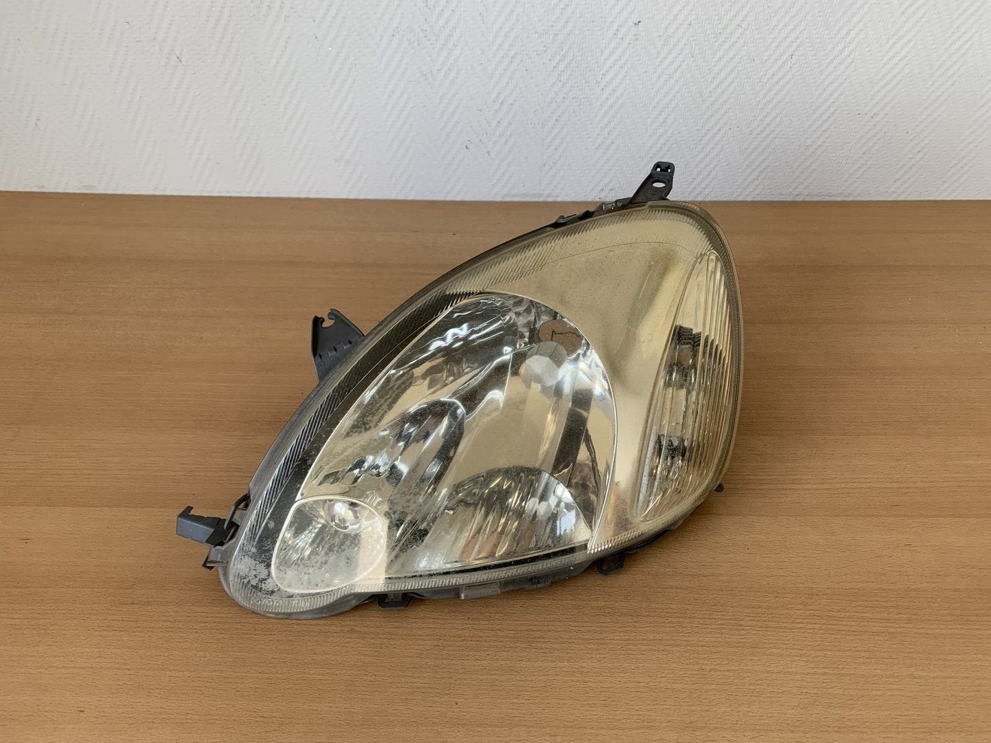 koplamp links toyota yaris I 2003 tot 2005 811500D08000, Gebruikt, -, -, Ophalen of Verzenden