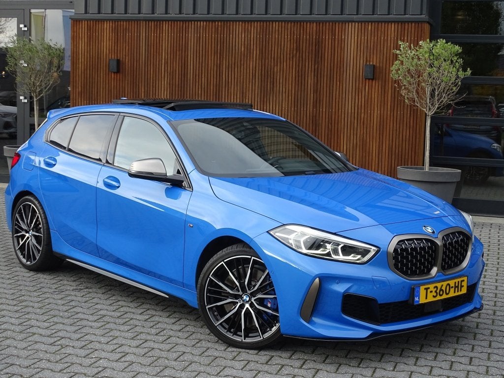 Bmw 1-serie M135i xDrive 306PK M-Individual, Auto's, Gebruikt, 4 cilinders, Blauw, Alcantara