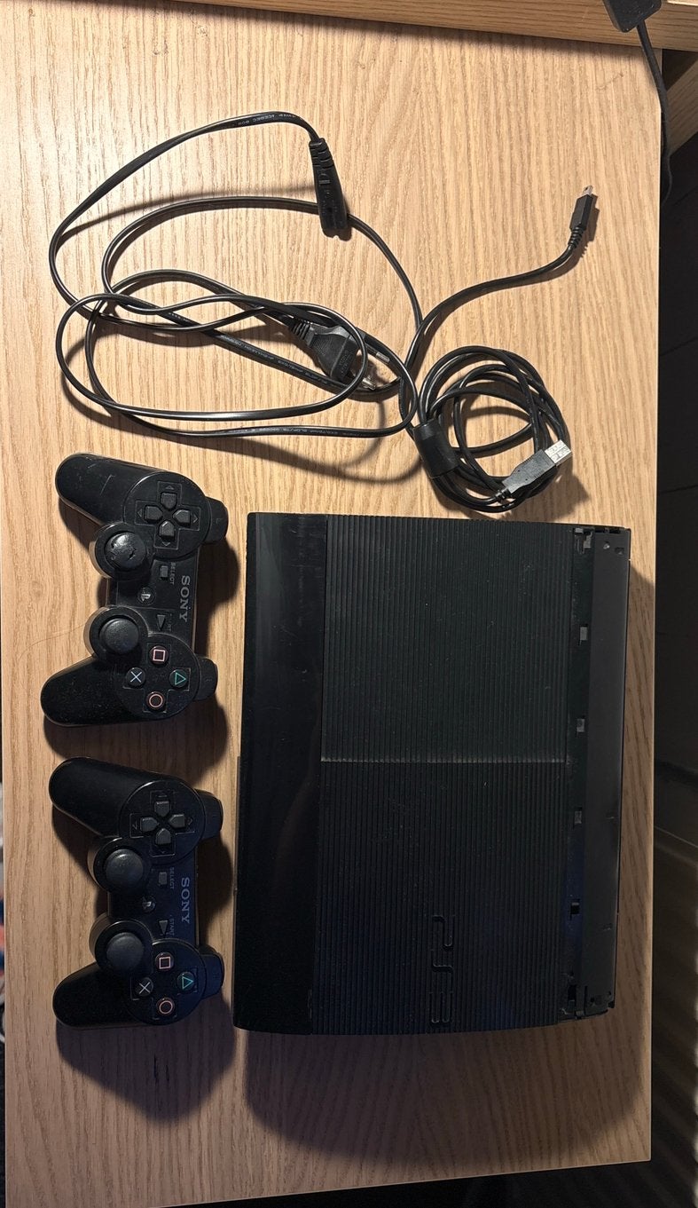 PlayStation 3 Slim Console met 2 Controllers & 15 Games, Ophalen of Verzenden, Zo goed als nieuw