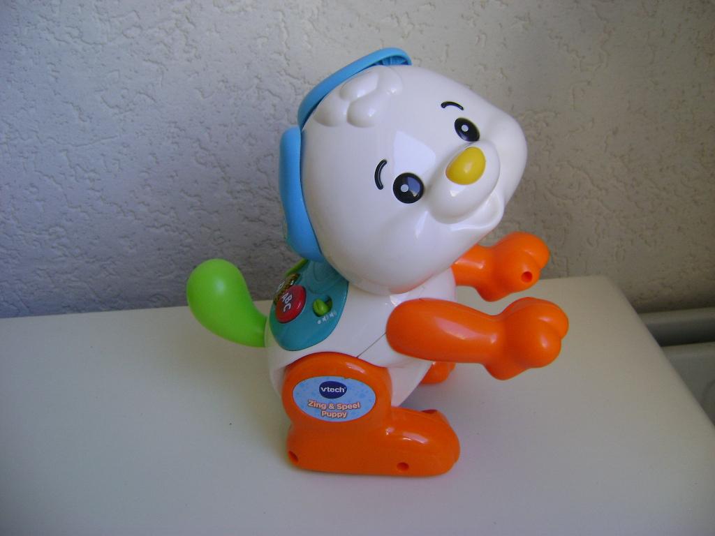 vitech zing en speel puppie v,a 12mnd met melodieen en lied, Ophalen of Verzenden, Zo goed als nieuw, 6 maanden tot 2 jaar