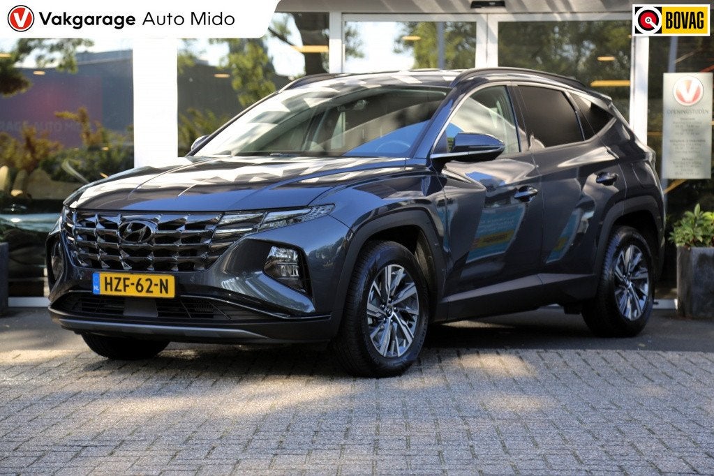 Hyundai Tucson 1.6 T-GDI HEV Comfort Smart (bj 2023), Gebruikt, 4 cilinders, 1650 kg, Origineel Nederlands