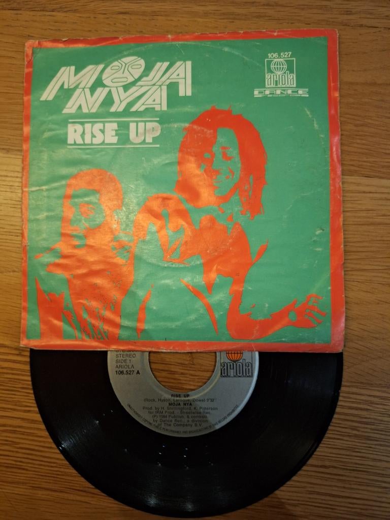 Moja Nya - Rise Up vinyl single (Ariola 106.527), Gebruikt, Overige genres, 7 inch, Single