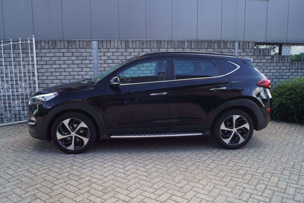 Hyundai Tucson 1.6 T-GDi Premium 4WD Autom Panodak Leder Spo, Auto's, Hyundai, Gebruikt, 4 cilinders, Zwart, Leder