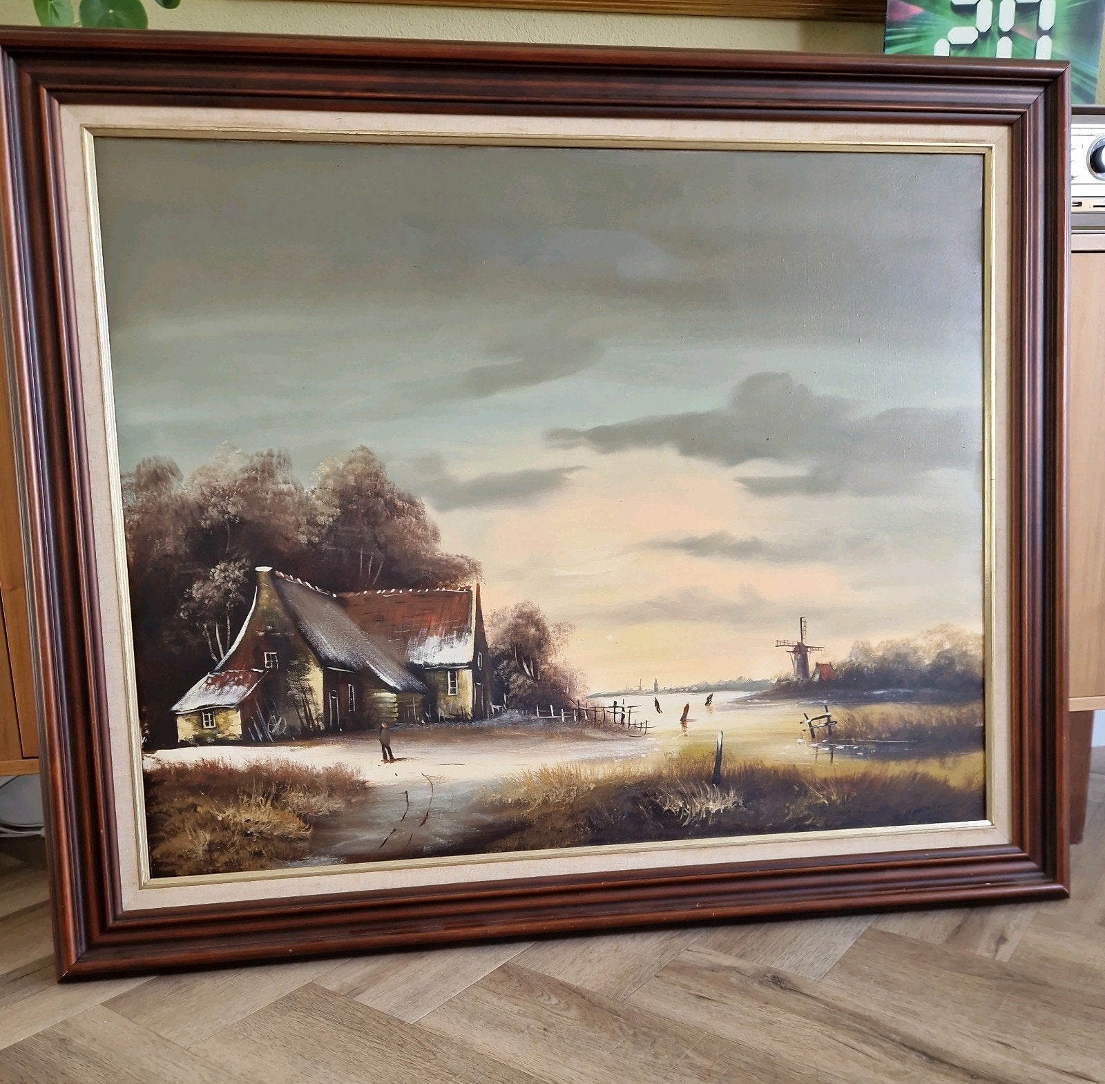 Schilderij winterlandschap, Ophalen