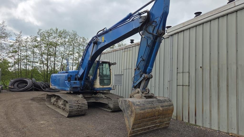 Rubskraan e215b new holland, Ophalen of Verzenden, Wiellader of Shovel