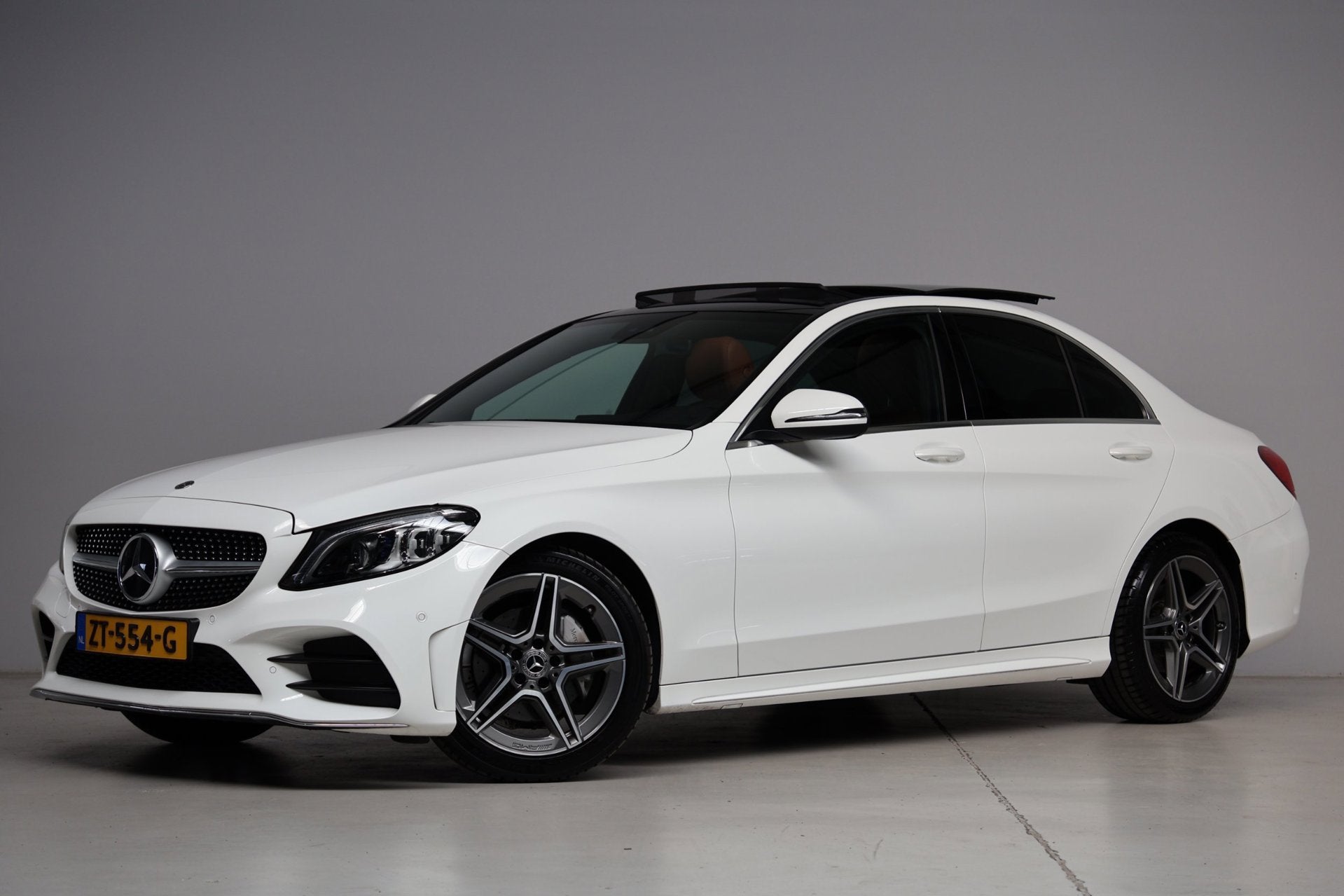 Mercedes-Benz C-klasse 180 AMG | panoramadak | dodehoek dete, Auto's, Dealer onderhouden, Euro 6, Wit, Sedan