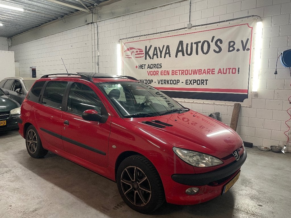 Peugeot 206 1.4 SW XS 2004 Rood, Auto's, Peugeot, Voorwielaandrijving, 4 cilinders, Origineel Nederlands, Handgeschakeld