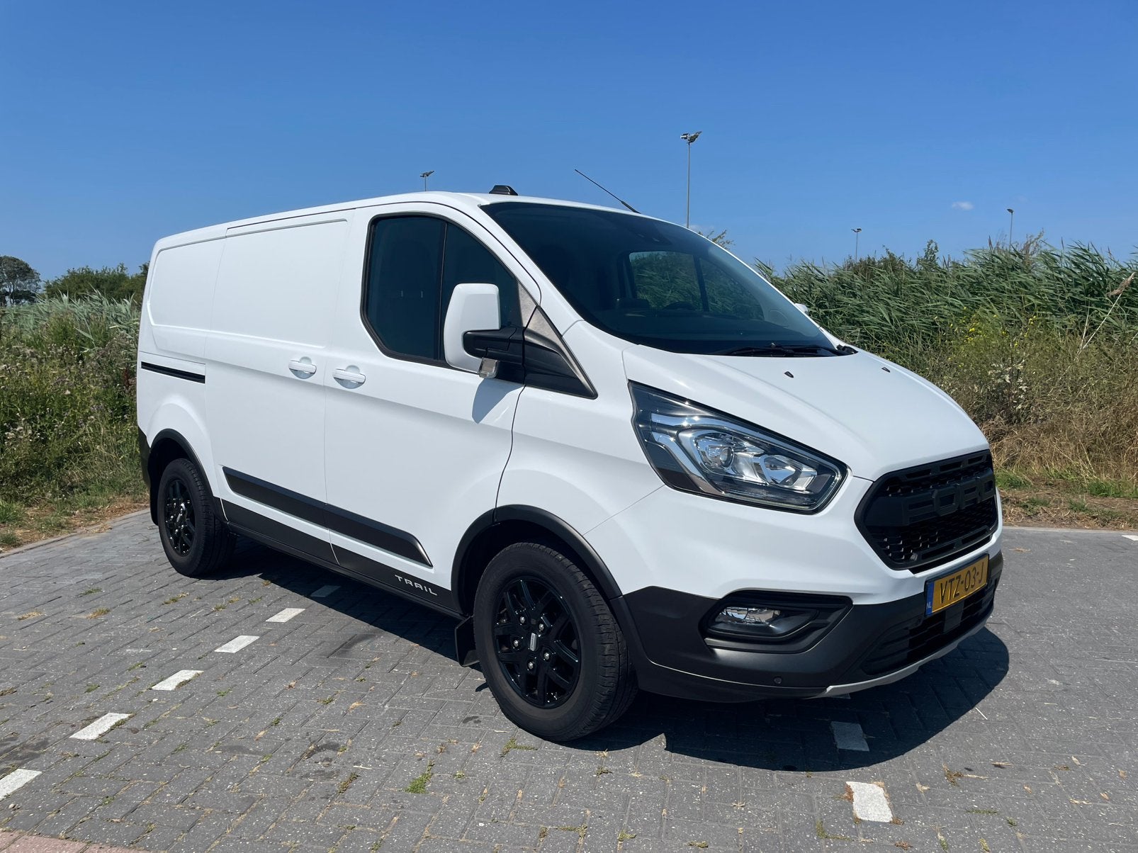 Ford Transit Custom Trail GB 2.0 Tdci 130PK L1h1, Auto's, Voorwielaandrijving, 1995 cc, Zwart, 4 cilinders