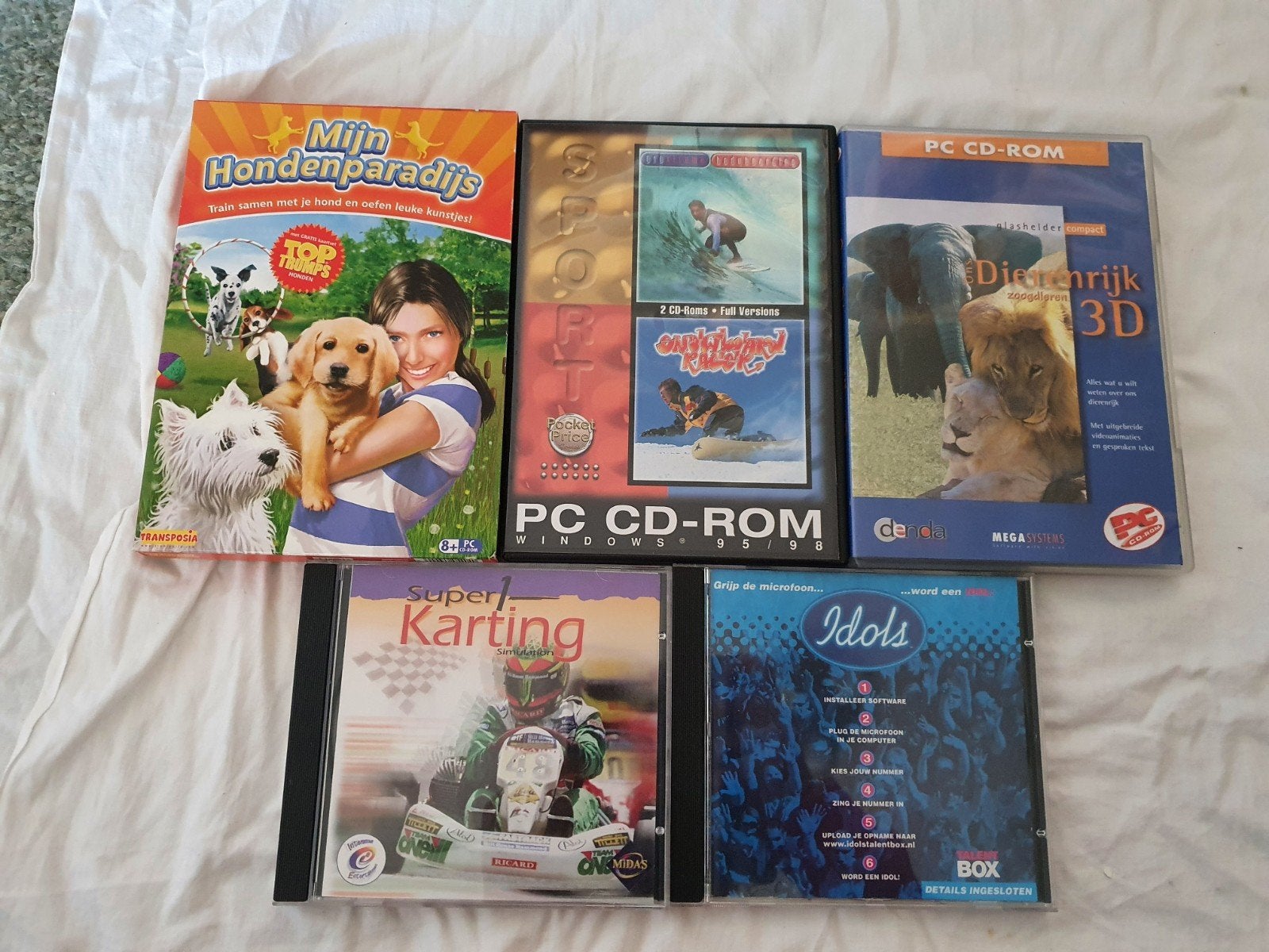 Pc games. Honden paradijs, dierenrijk, surfen idols karting, Ophalen of Verzenden, Gebruikt, Puzzel en Educatief