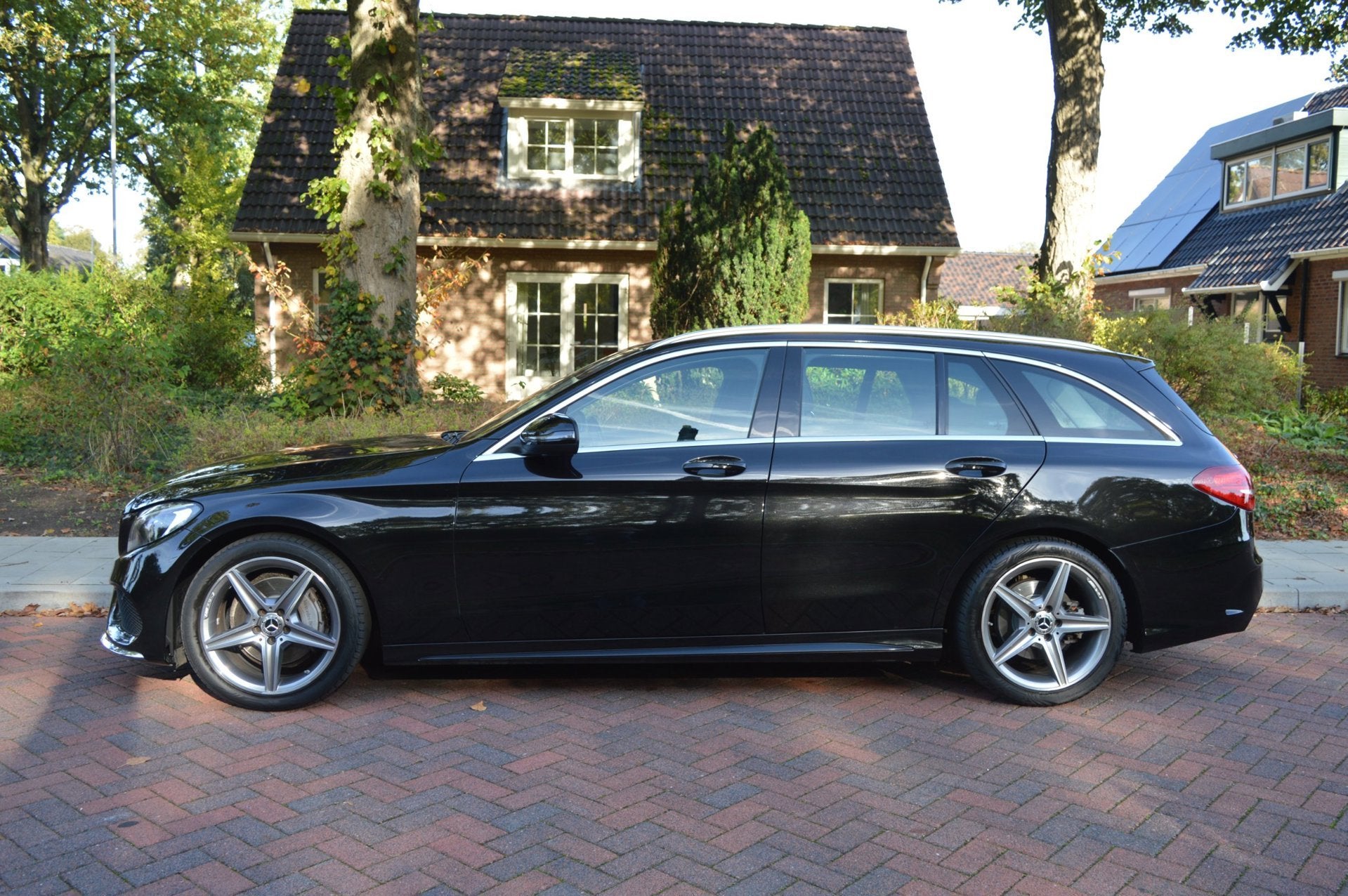 Mercedes-Benz C-klasse Estate 200 Prestige AMG-styling /navi, Automaat, Achterwielaandrijving, 4 cilinders, Zwart