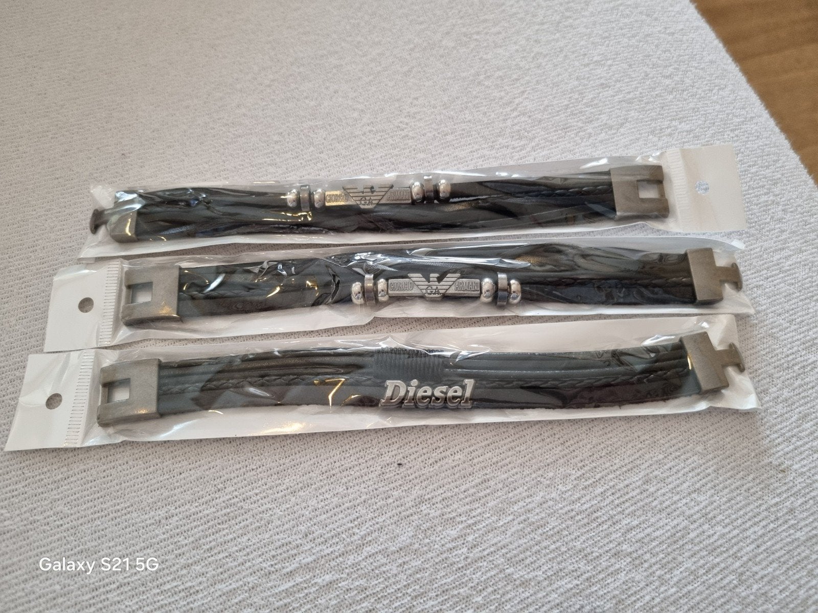 Diesel en Armani leren armbandjes!!, Ophalen of Verzenden, Nieuw, Zilver, Leer