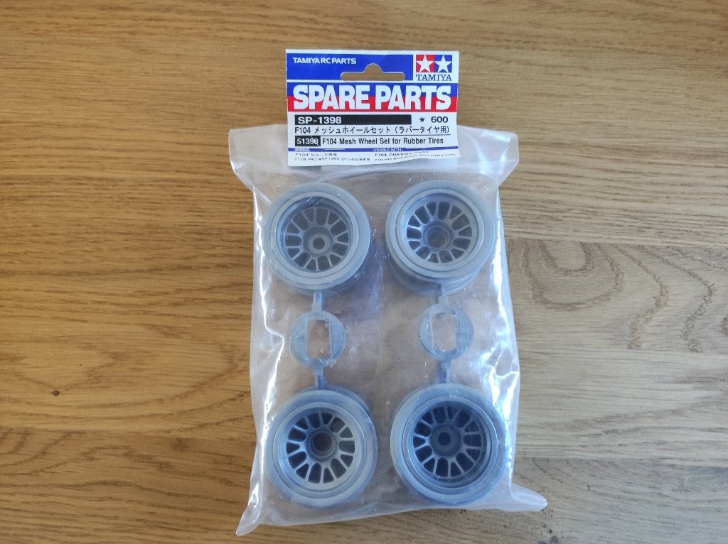 Nieuwe Tamiya F104 Mesh Wheel Set Rubber Tires #51398, Elektro, Nieuw, Ophalen of Verzenden, Schaal 1:10