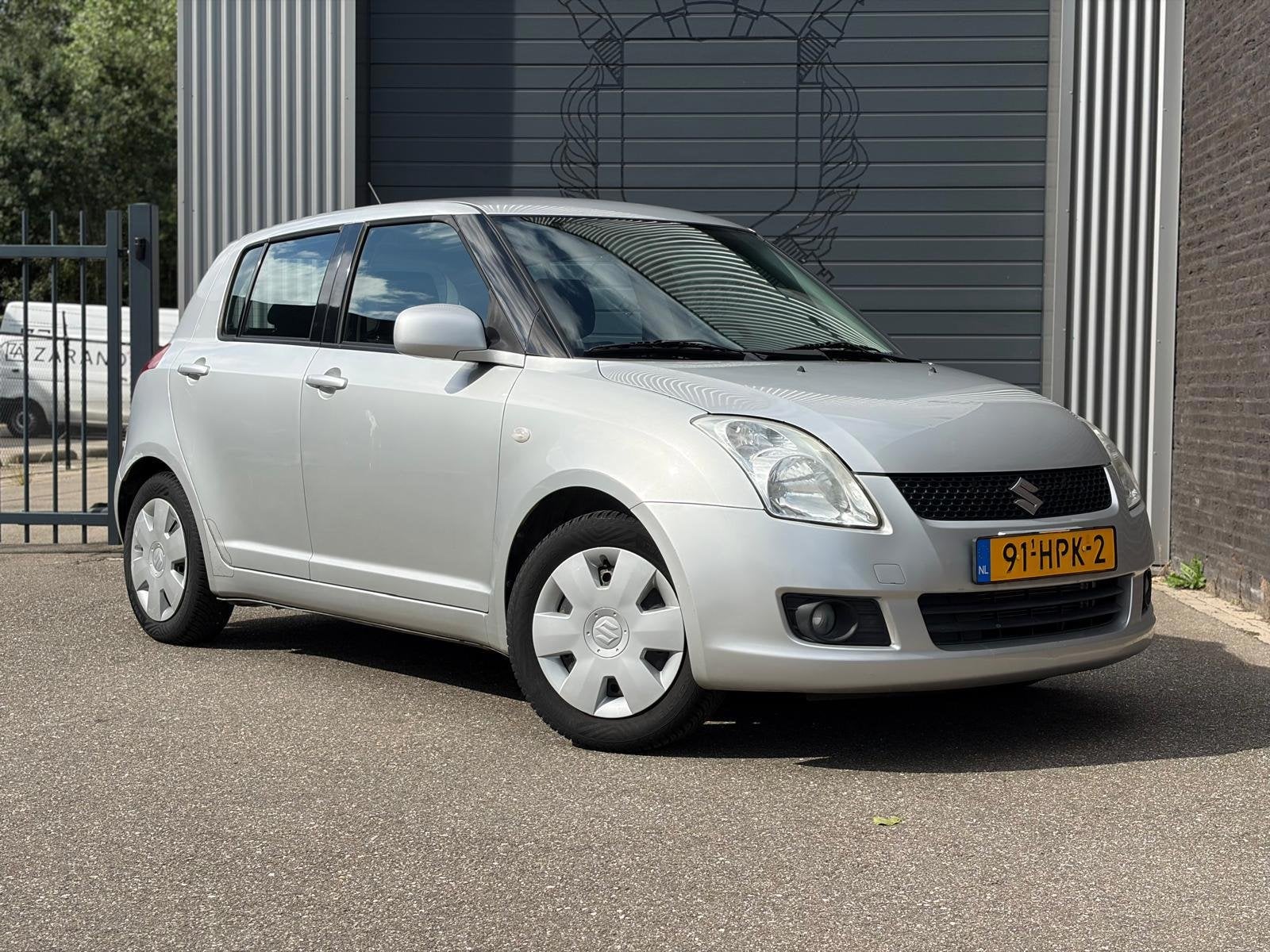 Suzuki Swift 1.3 Shogun Airco|Nap, Voorwielaandrijving, Stof, 400 kg, Swift