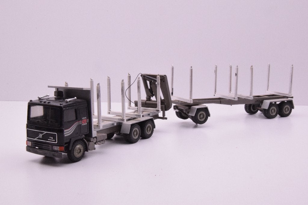 Volvo F12 bomentransporter  '' Conrad '', Hobby en Vrije tijd, Modelauto's | 1:50, Ophalen of Verzenden, Zo goed als nieuw, Bus of Vrachtwagen