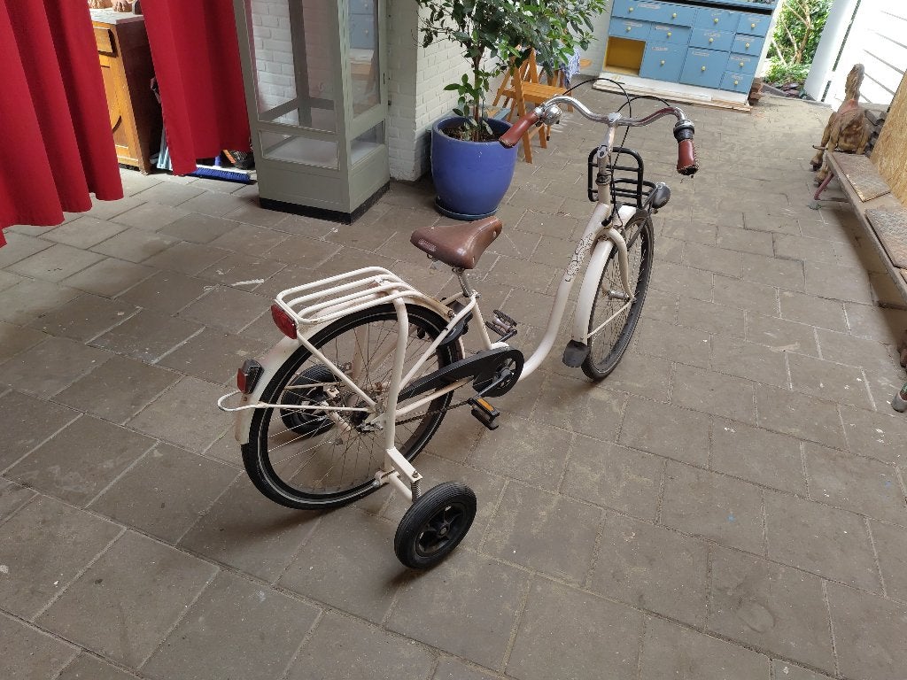 Nijland kinderfiets met zijwielen te koop, Ophalen, 20 inch of meer, Zijwieltjes, Gebruikt