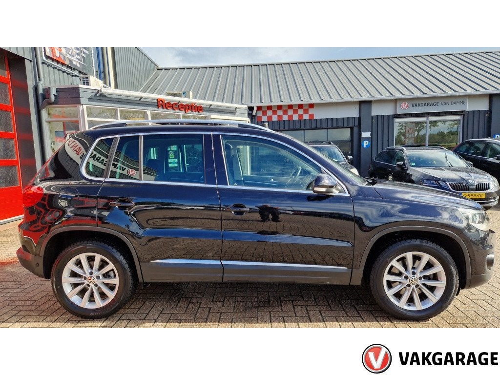 Volkswagen Tiguan 1.4 TSI Sport&Style (bj 2014), Auto's, Voorwielaandrijving, Euro 5, 15 km/l, Gebruikt
