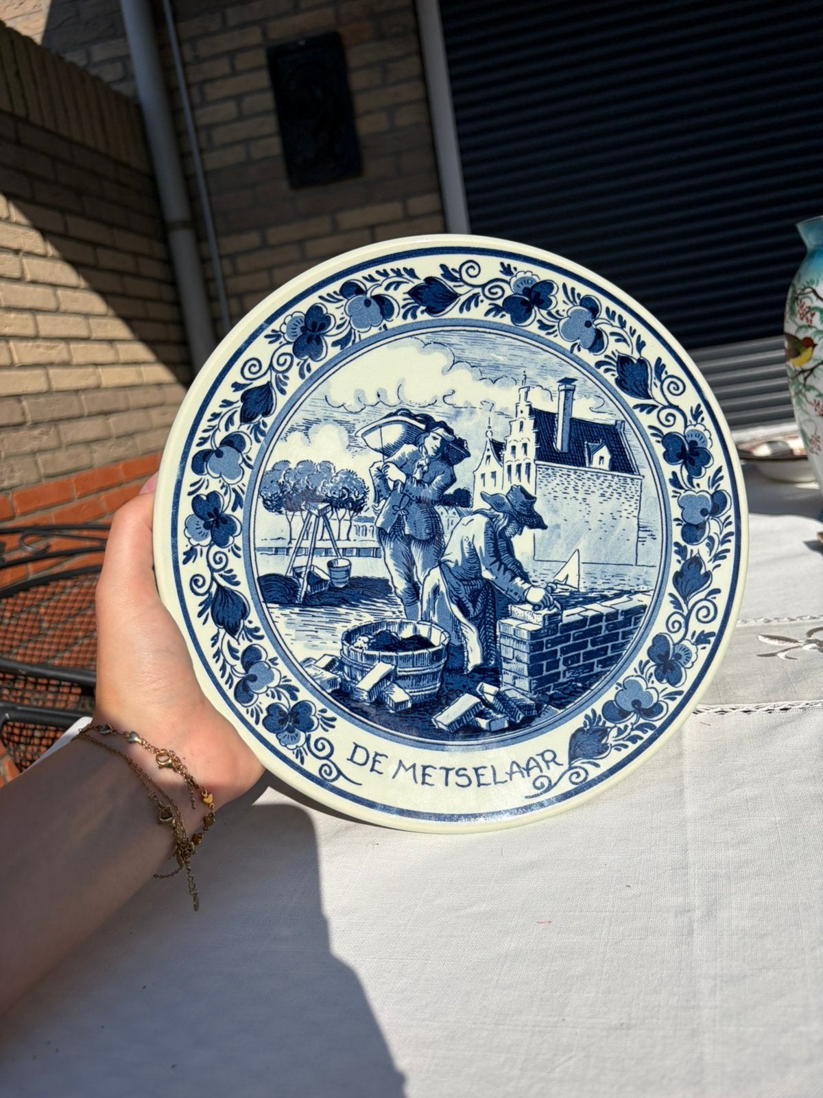 Delfts blauw wandbord De Metselaar (Goedewaagen), Ophalen
