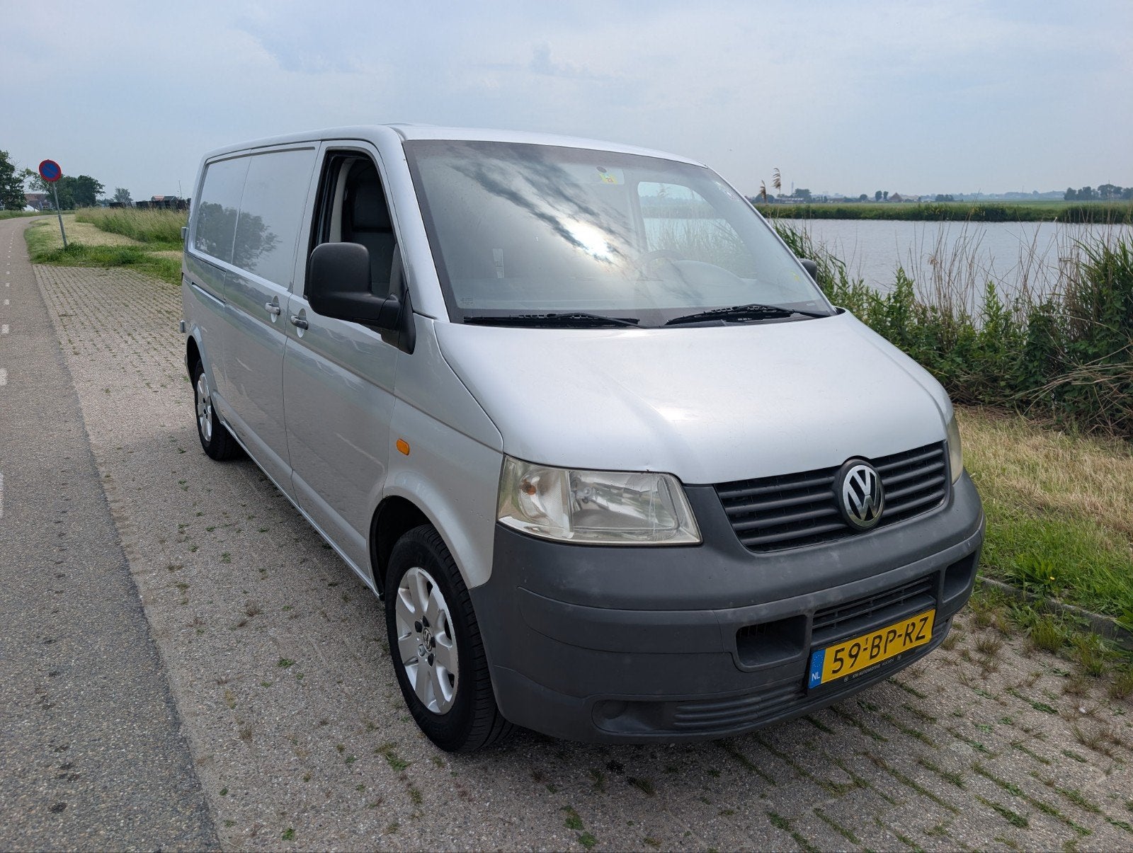 Volkswagen T5 verlengde versie 1.9 TDI 77KW - 2004, Auto's, Voorwielaandrijving, Bluetooth, Stof, 4 cilinders