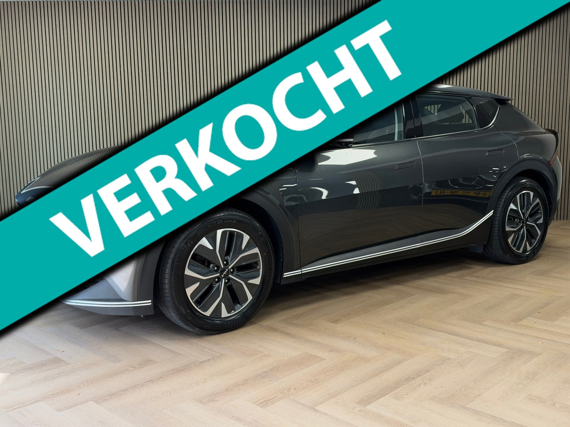 Kia EV6 Plus AWD 77.4 kWh 325PK SOH 100% 506KM Bereik NAVIGA, Auto's, Dealer onderhouden, Gebruikt, Met garantie (alle), Leder en Stof