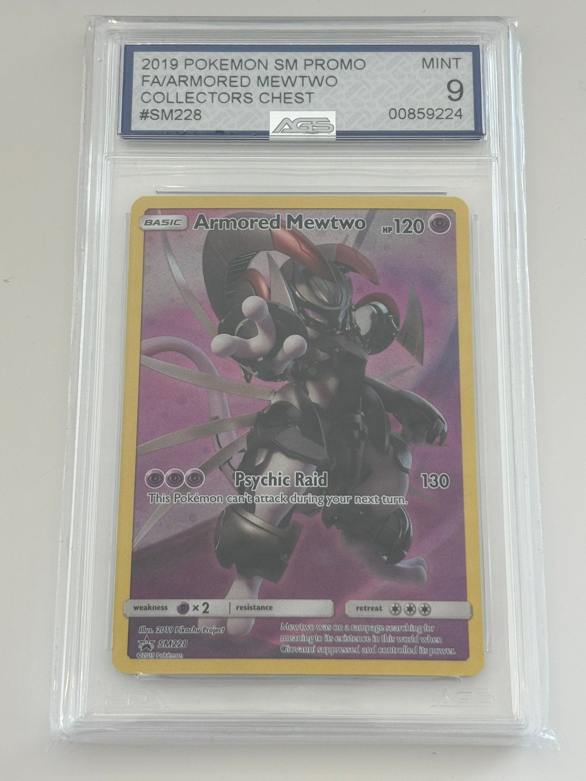 Pokémon Armored Mewtwo SM228 Promo – AGS 9 Graded – Mint, Ophalen of Verzenden, Zo goed als nieuw, Losse kaart, Foil