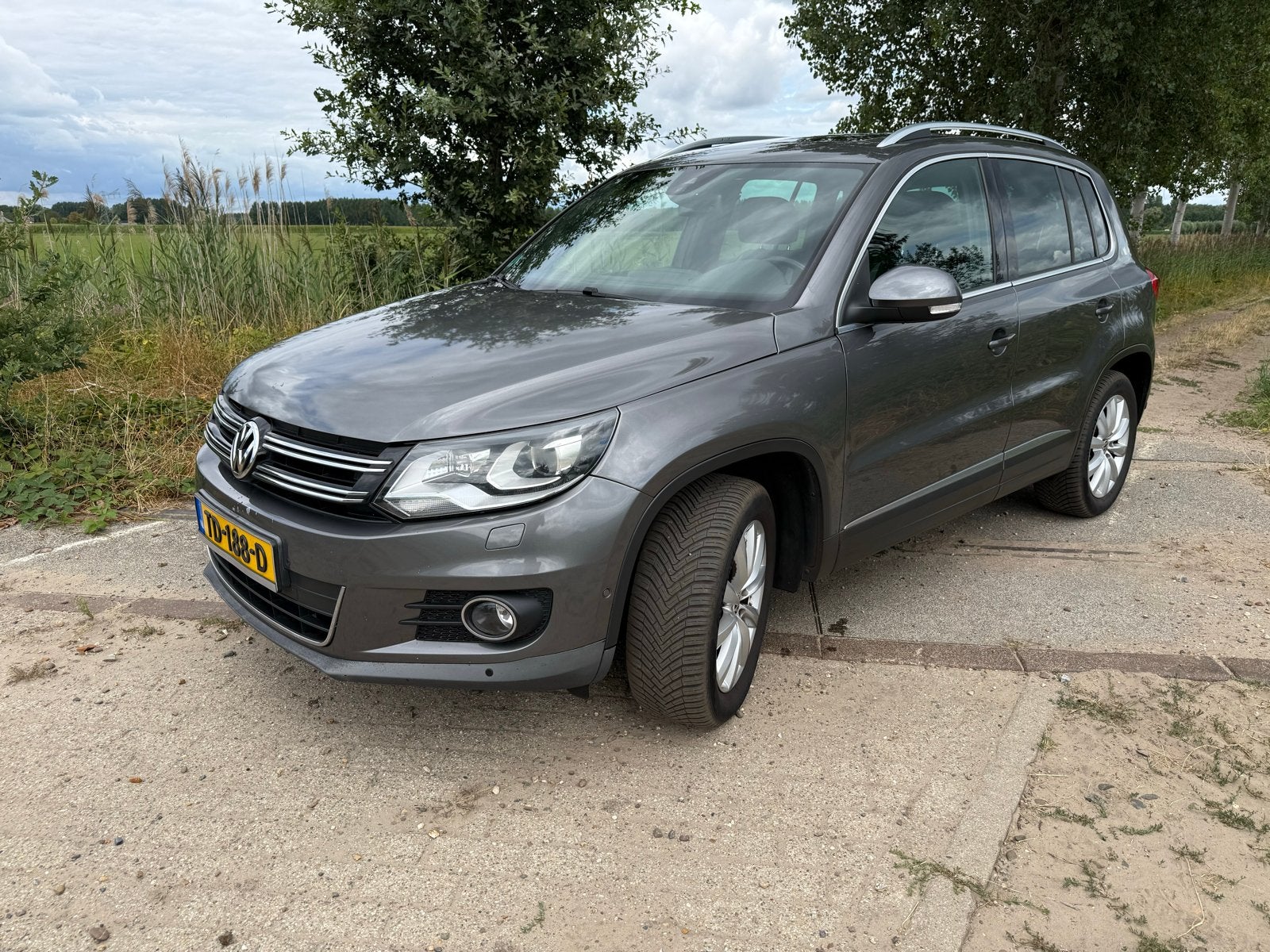 Volkswagen Tiguan 2.0 TSI 132KW/180PK 4Motion 7-DSG 2013, Auto's, Automaat, Euro 5, Stof, Zwart