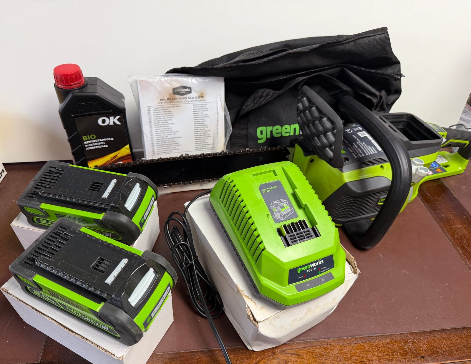 Greenworks Accu Kettingzaag 40V met 2 accu's en lader, Ophalen, Gebruikt
