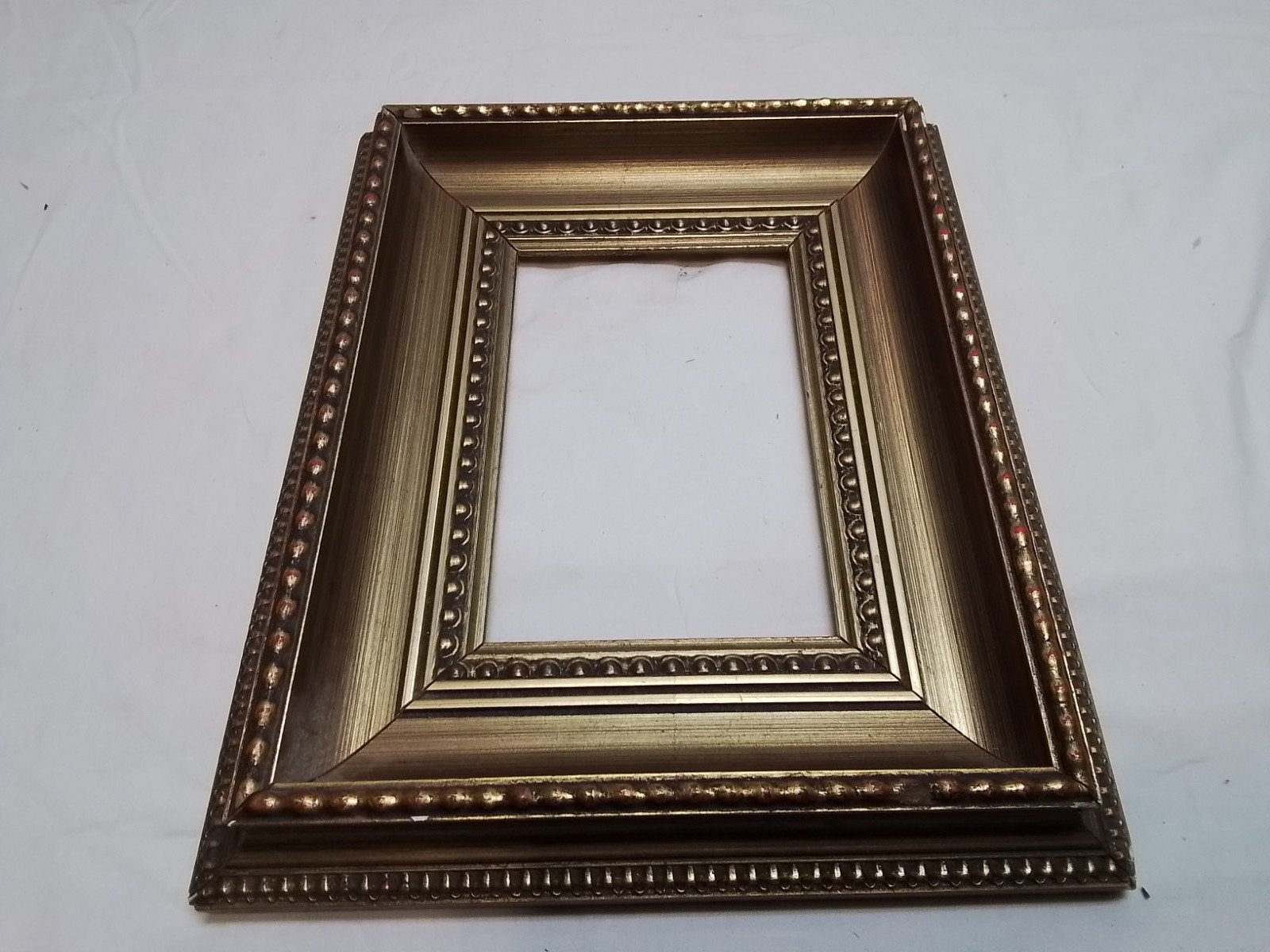 Gouden fotolijst met sierrand - Gebruikt, Huis en Inrichting, Woonaccessoires | Lijsten, Ophalen of Verzenden
