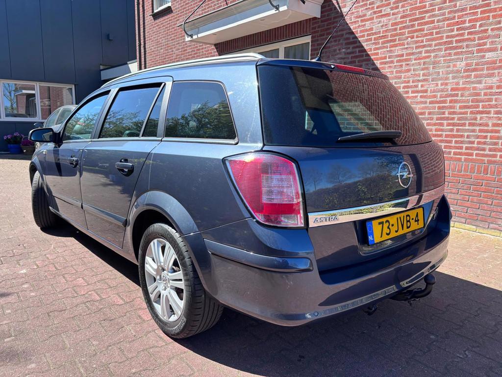 Opel Astra Wagon 1.6 Cosmo, Auto's, Opel, Voorwielaandrijving, 15 km/l, Gebruikt, Zwart