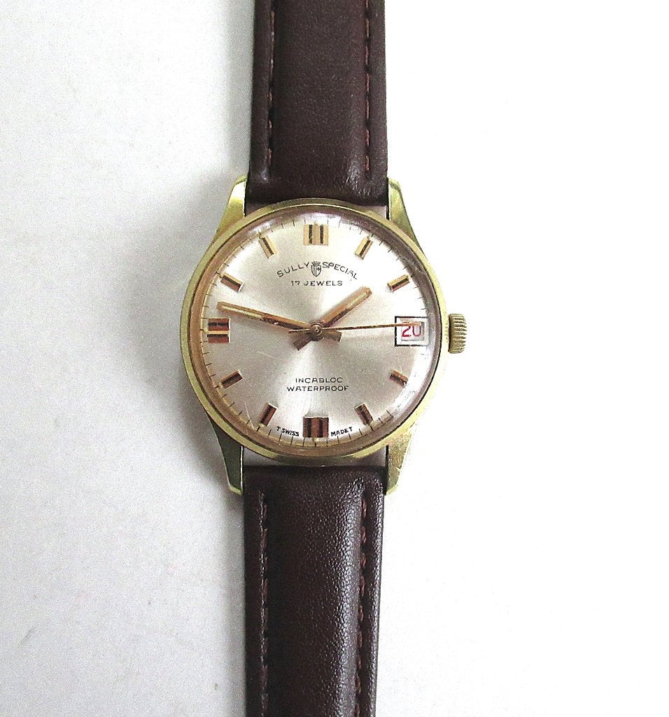 Vintage Sully Special Swiss herenhorloge met kalender, 50-60, Ophalen of Verzenden, Staal, Overige merken, 1960 of later