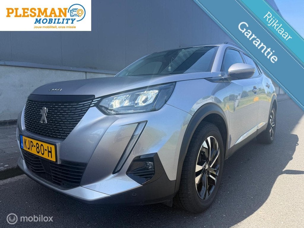 Peugeot 2008 1.2 PureTech Allure Automaat, Gebruikt, Euro 6, 1199 cc, Leder en Stof