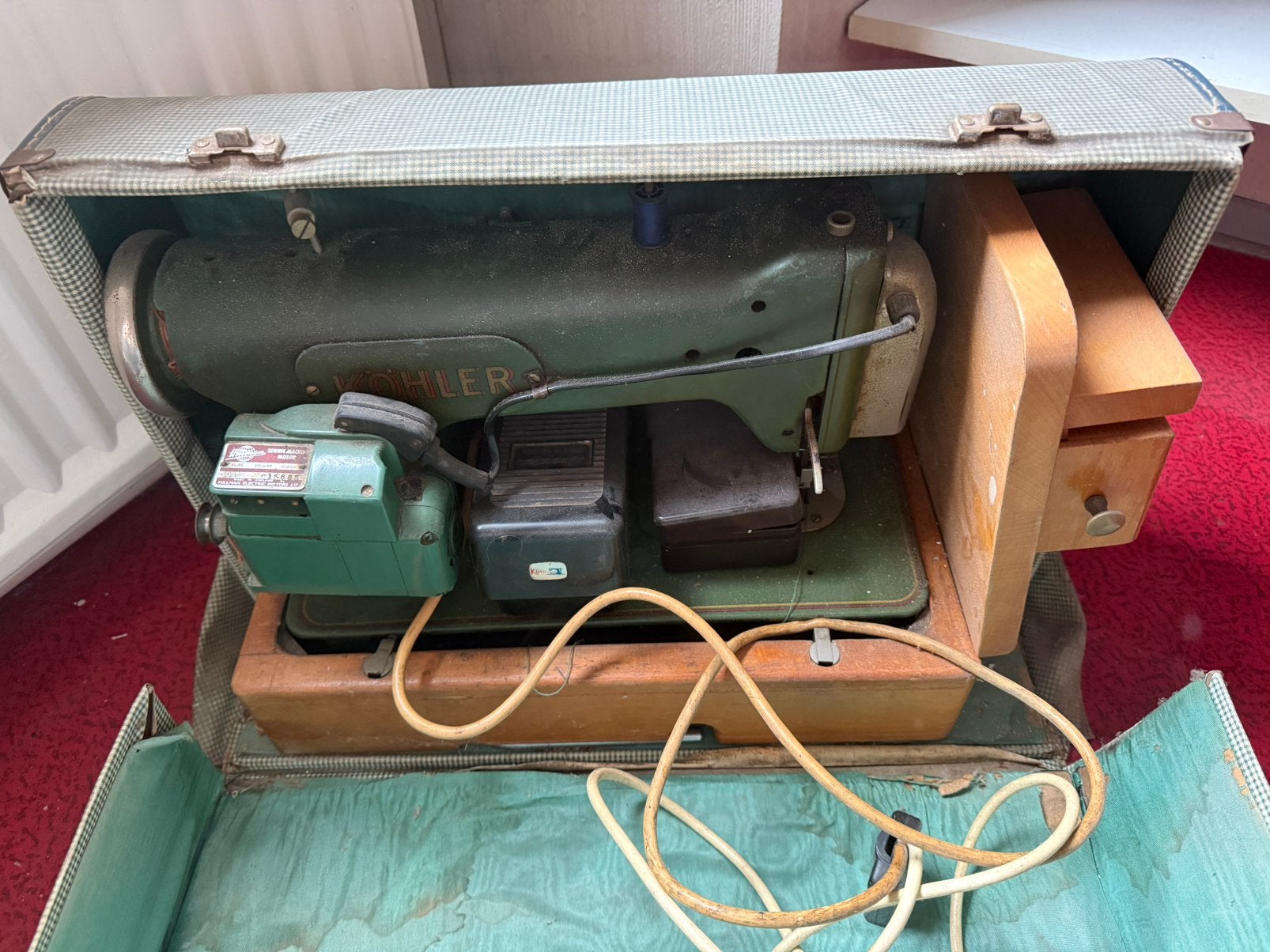 Antiek Kohler naaimachine, Ophalen