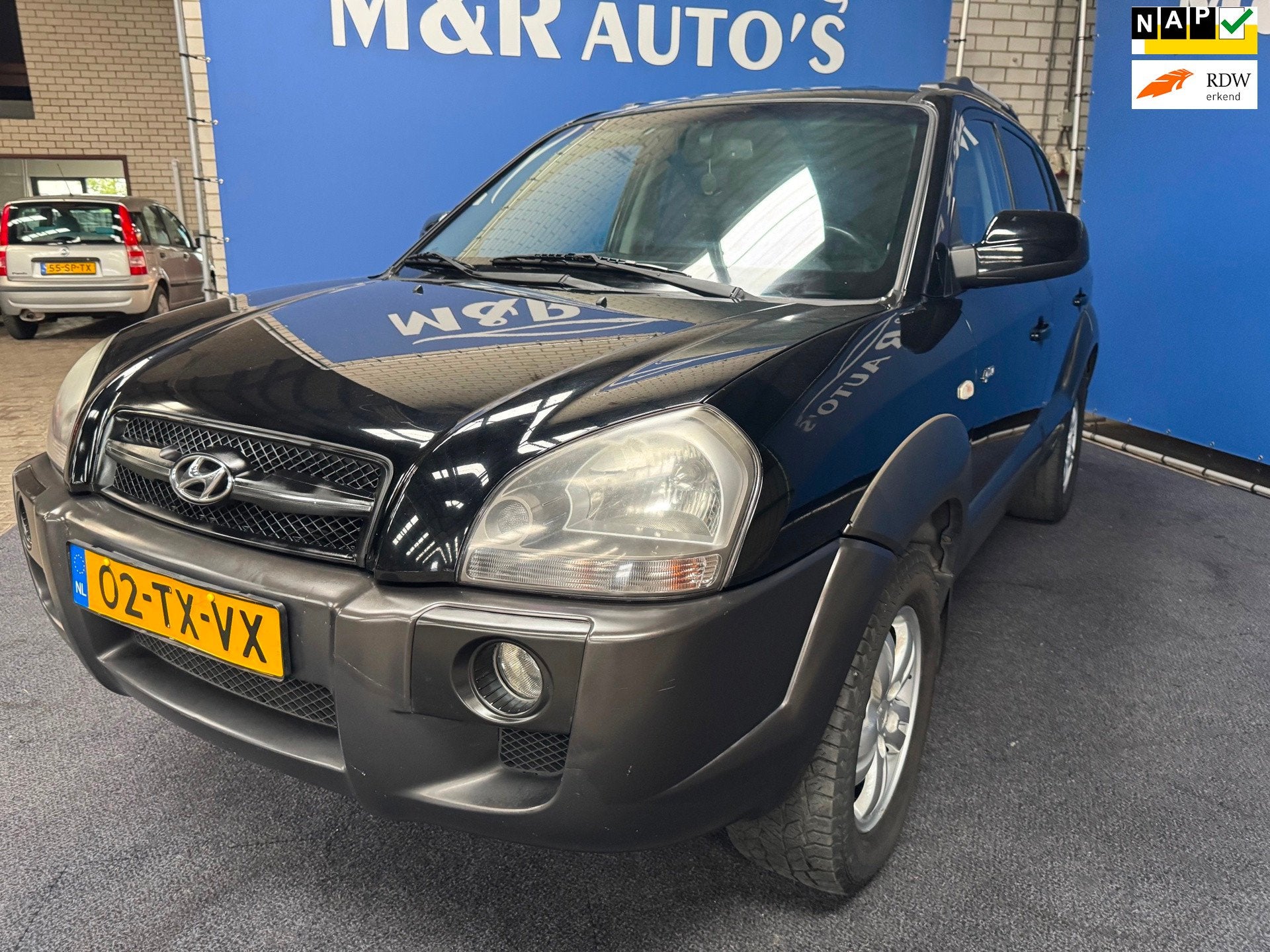 Hyundai Tucson 2.7i V6 4WD Style Automaat met Nieuwe APK, Auto's, Automaat, Gebruikt, 2656 cc, Zwart