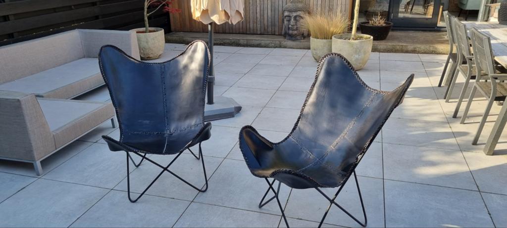 2 Leren vlinderstoelen, Huis en Inrichting, Stoelen, Ophalen of Verzenden, Zwart, Eén