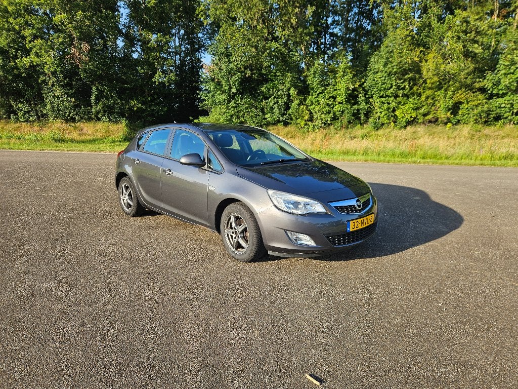 Opel Astra 1.4 74KW 5D 2010 Grijs, Auto's, Opel, Particulier, Astra, ABS, Airbags, Airconditioning, Automatische klimaatregeling